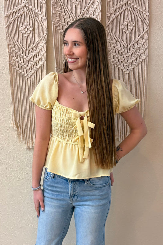 Sally Bow Front Smocked Peplum Top